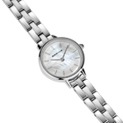 Diagonal overhead view of the pale mottled dial, silver-tone case and silver-tone link bracelet.