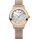 Reloj BERING de frente: esfera clara veteada, caja rosada y correa de malla rosada.