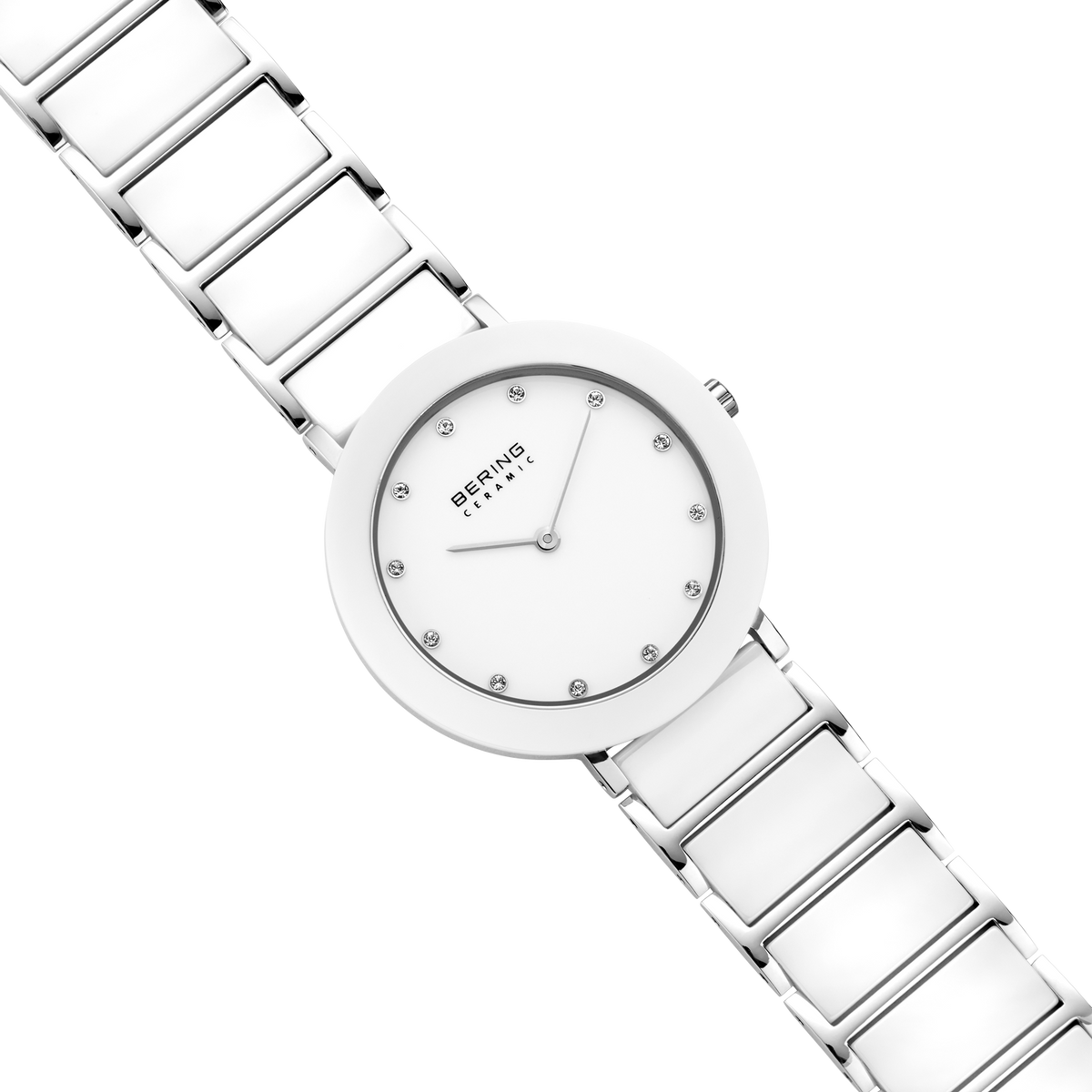 Diagonal overhead view of the white dial with bright dot markers, silver-tone with white bezel case and white-centered silver-tone link bracelet.