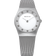 Front view of a silver-tone mesh watch with a small pale dial surrounded by square bright markers.