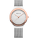 Front view: pale dial with bright dot markers, oval rose-tone case and silver-tone mesh strap.