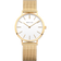 Reloj BERING de frente: esfera blanca, caja dorada y correa de malla dorada.