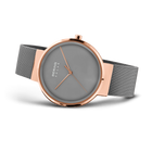 Angled watch view: grey dial and grey mesh strap extended.