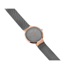 Diagonal overhead view of the grey dial, rose-tone case and grey mesh strap.