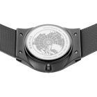 Engraved watch case back with the grey mesh strap extended to either side.