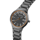 Angled close-up of the grey dial with an orange outline and dark silver-tone case beside the grey link bracelet.