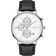 Reloj BERING de frente: esfera blanca con tres subesferas, caja plateada y correa negra con costuras.