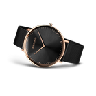 Angled watch view: black dial and black mesh strap extended.