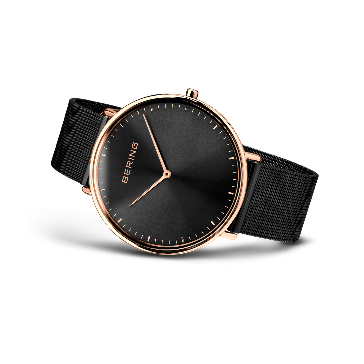 Angled watch view: black dial and black mesh strap extended.