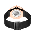 Rear view of the watch with its black mesh strap looped and fastener closed.