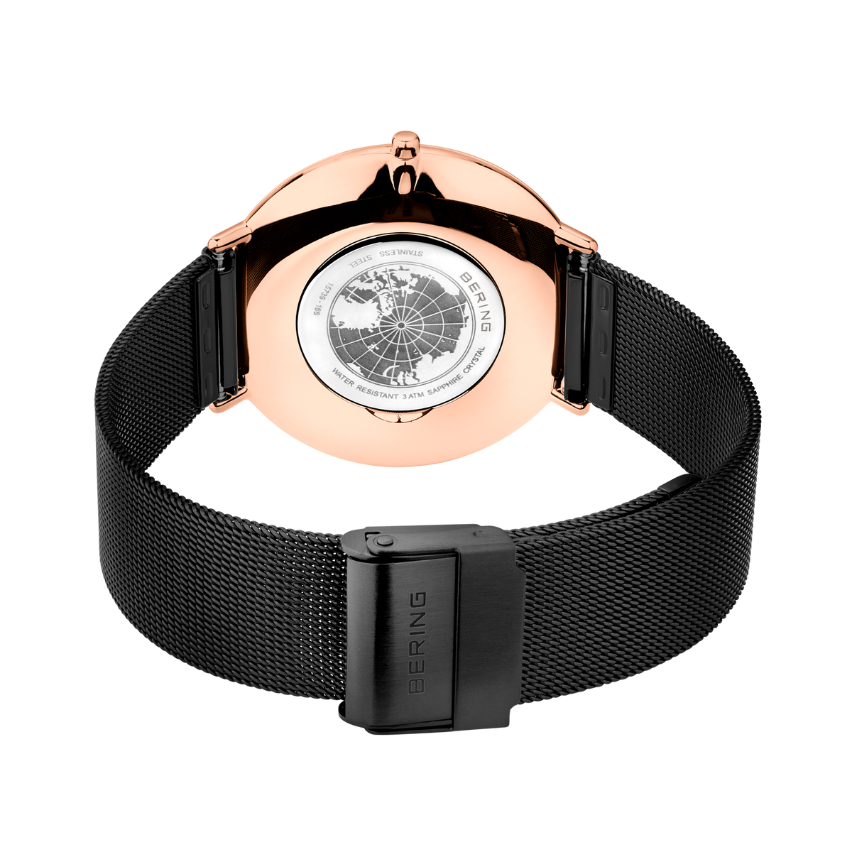 Rear view of the watch with its black mesh strap looped and fastener closed.