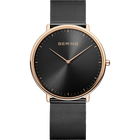 Front view: black dial, rose-tone case and black mesh strap.