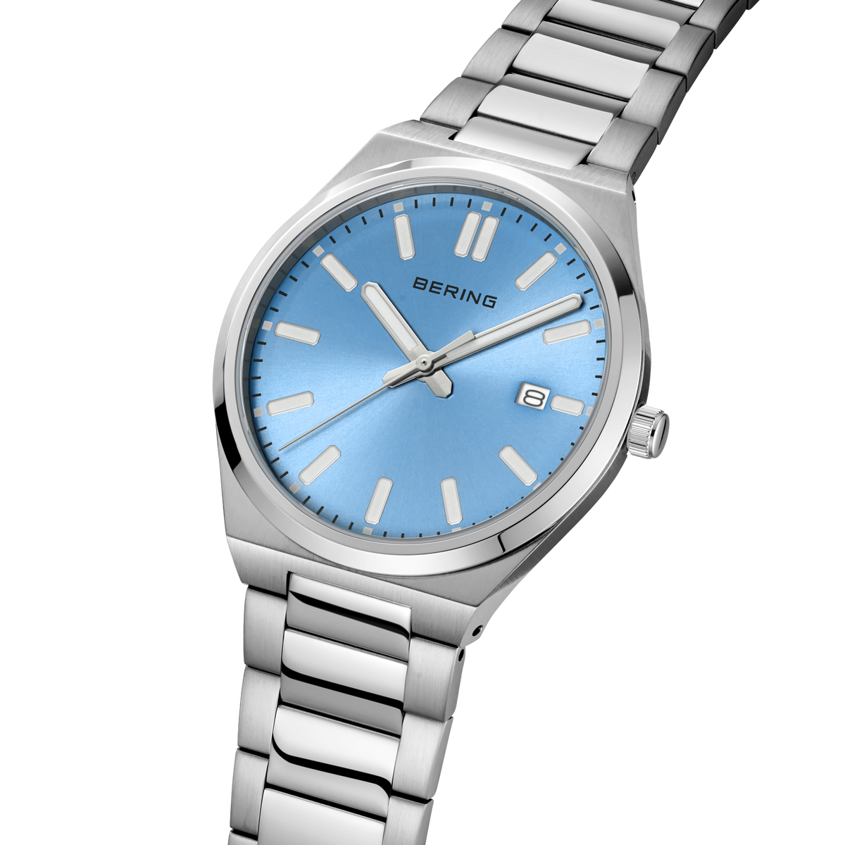 Angled close-up of the light blue dial and silver-tone case beside the silver-tone link bracelet.