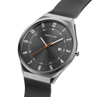 Angled close-up of the grey dial with an orange hand and grey case beside the grey mesh strap.