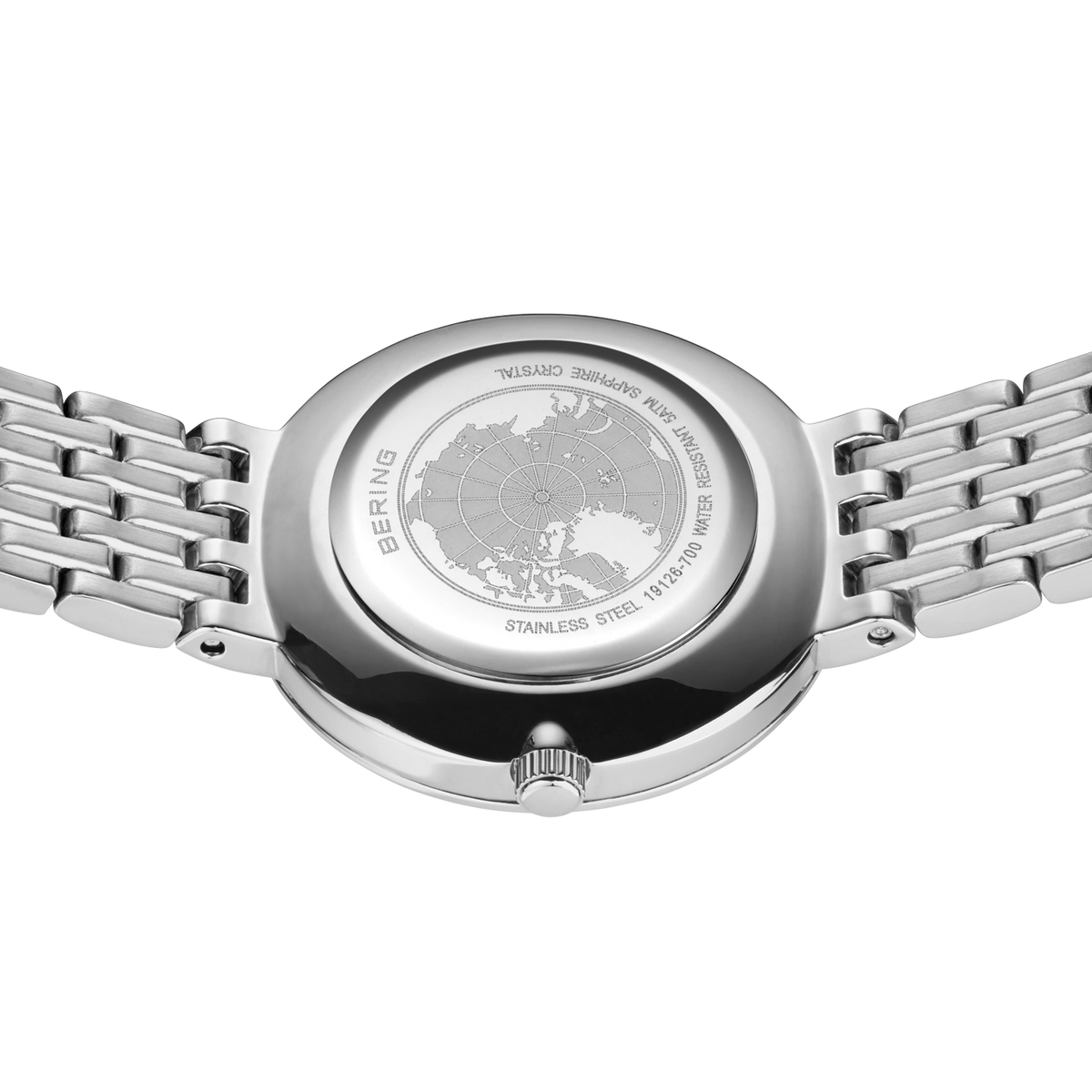 Engraved watch case back with the silver-tone link bracelet extended to either side.